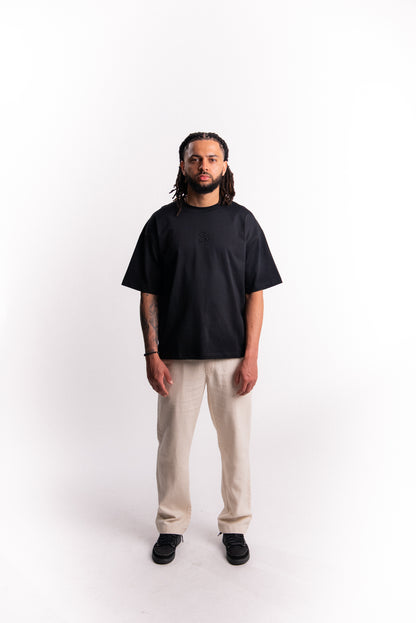 SILNTPLAY Embossed Tee in Obsidian, tonal embossed SP monogram detail