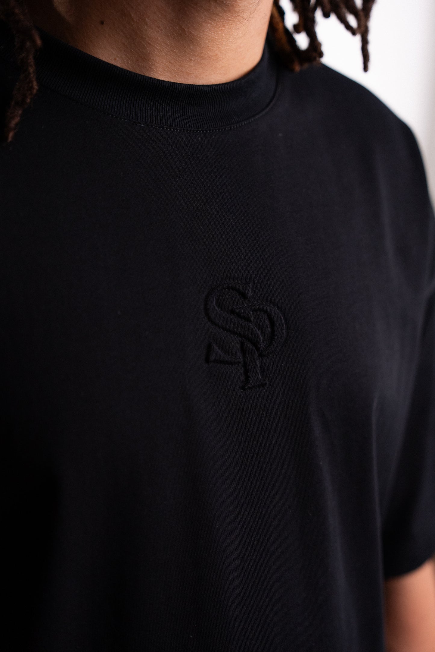 SILNTPLAY Embossed Tee in Obsidian, 280gsm combed cotton detail
